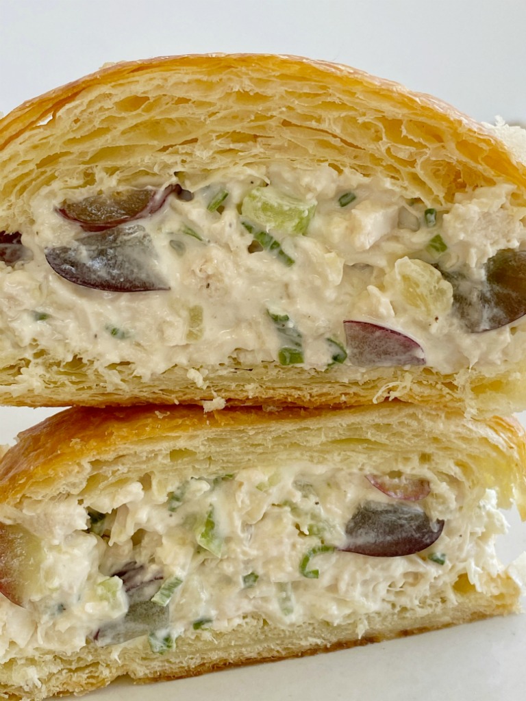 Pineapple Chicken Salad Sandwiches with chunks of chicken, crushed pineapple, grapes, green onions, almonds, and celery in a deliciously creamy dressing! We love this chicken salad with croissants.