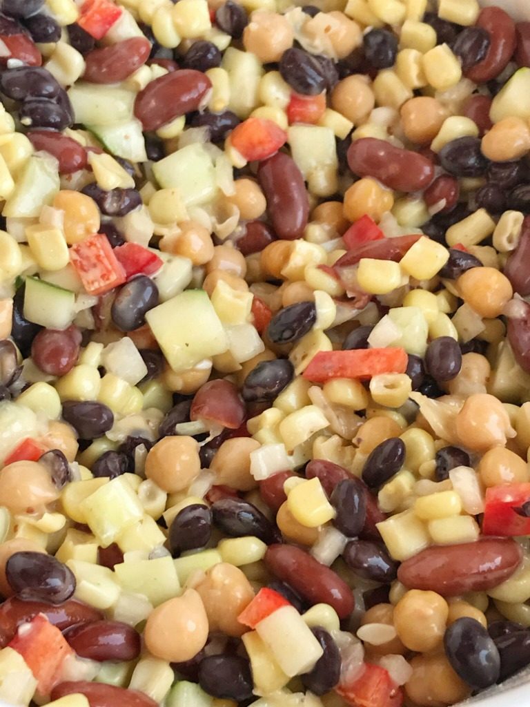 The Best Bean Salad | Salad | Side Dish | This really is the best bean salad ever! Easy, simple ingredients and fresh vegetables combine to make the tastiest, creamiest bean salad. Perfect side dish for a gathering, potluck, or BBQ. This bean salad uses convenient honey mustard salad dressing that gives it a creamy sweet flavor. #salad #sidedish #beansalad #easyrecipe