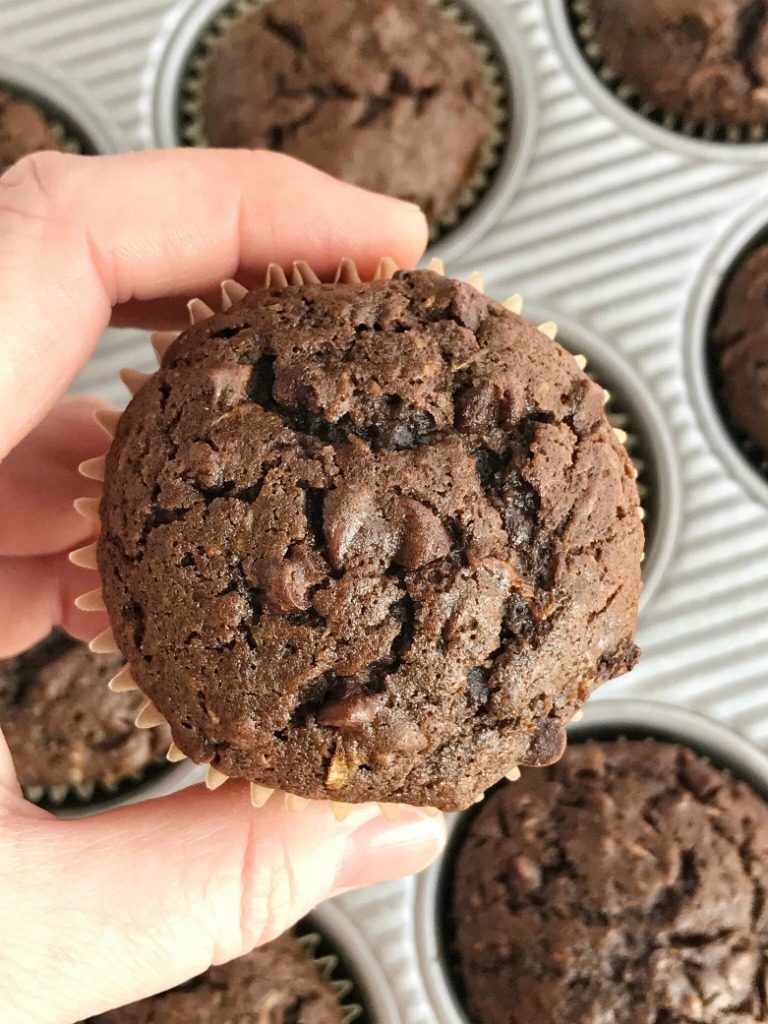 Chocolate Zucchini Muffins | Chocolate zucchini muffins are loaded with chocolate, chocolate chips and plenty of zucchini! Shredded zucchini makes these chocolate muffins so moist and crazy delicious. #muffins #chocolate #easyrecipes