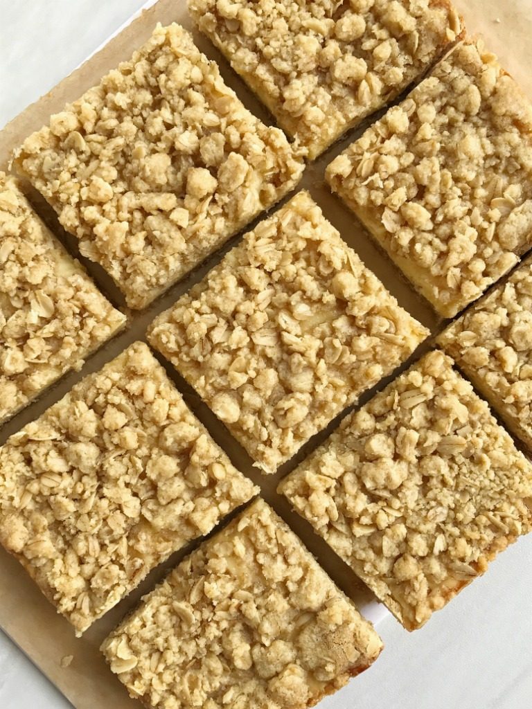 Creamy, tart, silky smooth lemon cream with a thick layer of a sweet oatmeal crust, and a good sprinkle of crumble on top. This is for all the lemon lovers out there. These lemon cream crumb bars are perfectly tart, sweet, and crumbly.