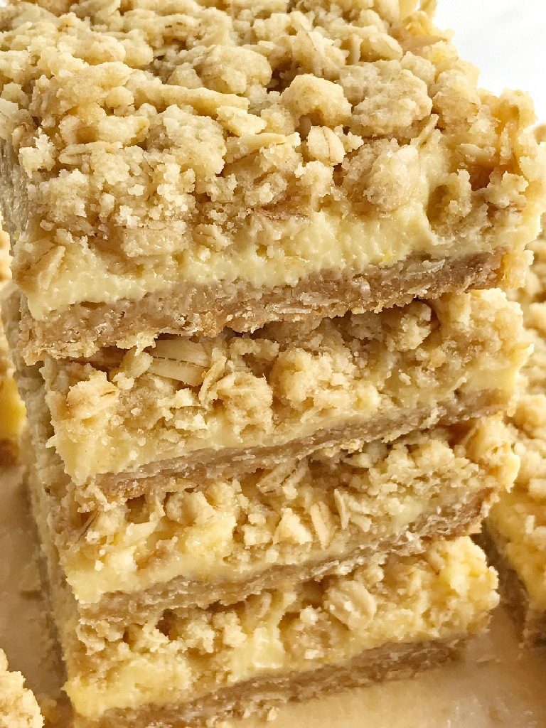 Creamy, tart, silky smooth lemon cream with a thick layer of a sweet oatmeal crust, and a good sprinkle of crumble on top. This is for all the lemon lovers out there. These lemon cream crumb bars are perfectly tart, sweet, and crumbly.