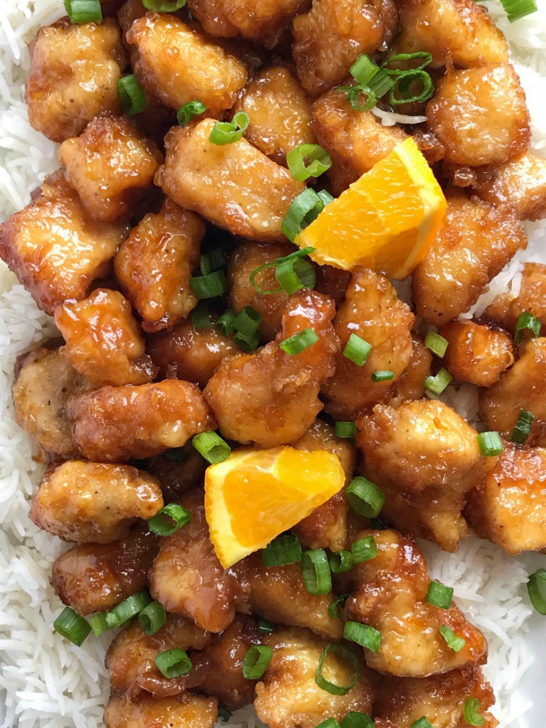 Baked Crispy Orange Chicken | Chinease Food | Dinner Recipe | Orange Chicken | Baked Orange Chicken | This baked orange chicken is tastes better than any Chinese take-out you'll get at a restaurant. Crispy coating of egg & cornstarch and then it's baked in a sweet and delicious orange sauce. This is a dish that you will want to make over and over. #dinnerrecipes #easydinnerrecipes #orangechicken #chicken #dinner #chineasefood