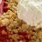 Strawberry Raspberry Crumble with juicy sweet fresh berries & topped with a sweet brown sugar oat buttery crumble. Serve with vanilla ice cream.