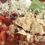 White Bean Turkey Chili | Turkey Chili Recipe | Turkey chili in a flavorful beef broth base, loaded with white beans, and warm seasonings. Serve this white bean turkey chili with sour cream, shredded cheese, and corn chips. #turkeychili #chili #onepot #groundturkey #healthyrecipe #recipeoftheday #easyrecipe