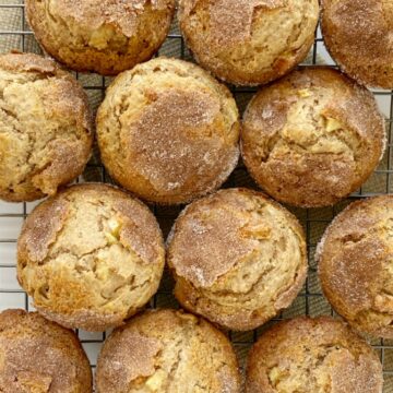 Apple Muffins with apple cider, applesauce, warm spices, and chunks of apple! They bake up so soft, perfectly rounded, and have a crunchy cinnamon & sugar topping. These are a Fall must make for my family.