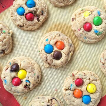 Thick, soft, chewy, melt-in-your-mouth delicious, and loaded with peanut butter m&m's. These peanut butter m&m cookies are sure to be a hit and I bet you that they won't last long!