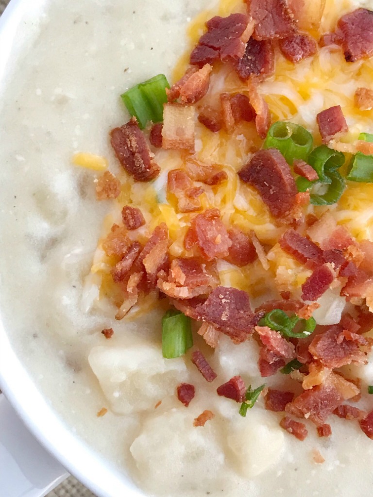 Slow Cooker Potato Soup | Potato Soup | This is the easiest potato soup you'll ever make because there is no peeling and chopping potatoes! This recipe uses a bag of frozen cubed potatoes. Let the slow cooker do all the work for a delicious creamy potato soup. Don't forget to top with bacon & cheese. #potatosoup #soup #souprecipes #easydinnerrecipes #slowcooker #crockpot