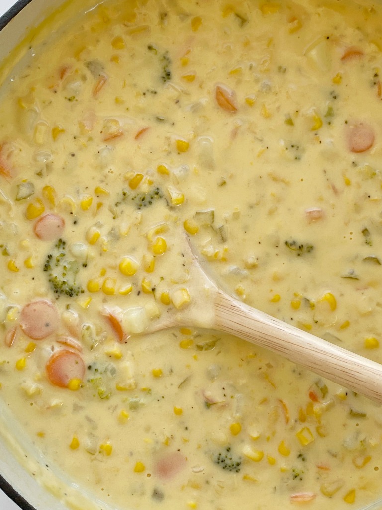 Vegetable Chowder is so cheesy and full of fresh veggies like broccoli, carrots, celery, potatoes, and corn! Even kids will eat this veggie-packed chowder recipe.