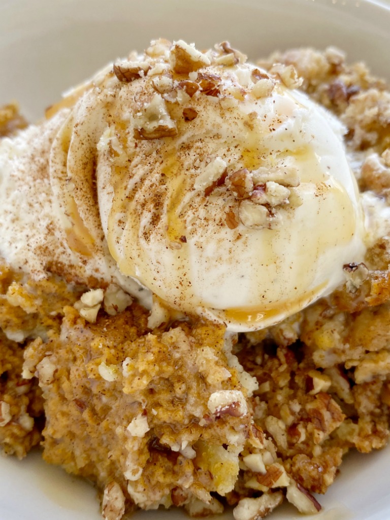 Pumpkin Pie Pecan Cobbler has a creamy pumpkin pie layer topped with a sweet spiced pecan crumble topping. Serve with a scoop of vanilla ice cream for the best pumpkin cobbler recipe that's perfect for Fall.