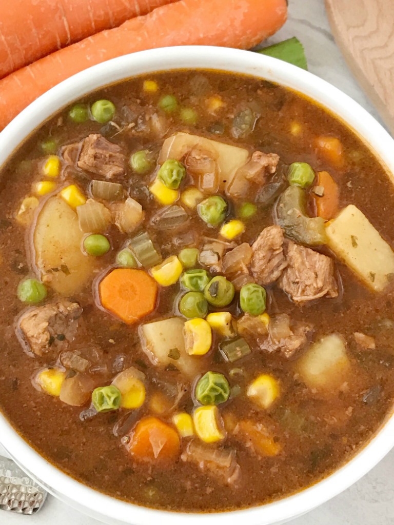 Slow Cooker Beef Stew | Beef Stew Recipe | Slow cooker beef stew is loaded with tender beef chunks, vegetables, and potatoes that cook in a flavorful tomato beef broth. This beef stew recipe is the ultimate comfort food that will warm you right up. #beefstewrecipe #crockpot #slowcooker #beef #stew