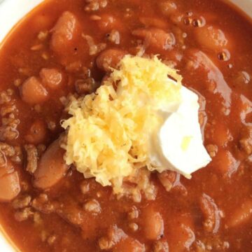 With so many variations of chili the classic version often gets overlooked. Not this one! This is the best classic chili. It's thick, rich, loaded with tomato flavor, lots of beef, and plenty of beans. It's sweet, warm, spicy (in flavor not heat), and so perfect with some sour cream and shredded cheddar cheese.