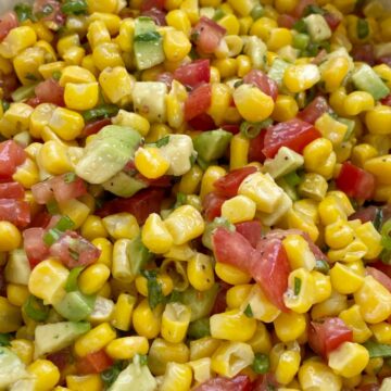 Salsa Recipes | Dip Recipes | Appetizer Recipes | Corn Avocado Salsa | Corn Salsa is the perfect blend of flavor and textures! Creamy avocados, frozen sweet corn, green onion, cilantro, and tomatoes in an easy Italian dressing olive oil vinaigrette. Serve as a healthy side dish, as salsa with tortilla chips, or on top of grilled meats.