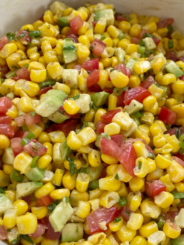 Salsa Recipes | Dip Recipes | Appetizer Recipes | Corn Avocado Salsa | Corn Salsa is the perfect blend of flavor and textures! Creamy avocados, frozen sweet corn, green onion, cilantro, and tomatoes in an easy Italian dressing olive oil vinaigrette. Serve as a healthy side dish, as salsa with tortilla chips, or on top of grilled meats. 