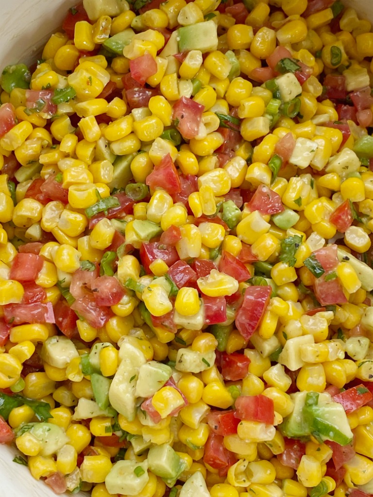 Salsa Recipes | Dip Recipes | Appetizer Recipes | Corn Avocado Salsa | Corn Salsa is the perfect blend of flavor and textures! Creamy avocados, frozen sweet corn, green onion, cilantro, and tomatoes in an easy Italian dressing olive oil vinaigrette. Serve as a healthy side dish, as salsa with tortilla chips, or on top of grilled meats. 