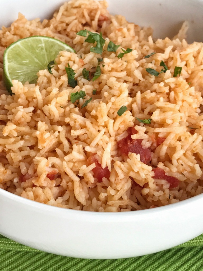This mexican rice will turn out perfectly each time! Fluffy, flavorful, and a great side to any Mexican dish. Only a few simple ingredients + seasonings is all you need. Bonus, no chopping required!