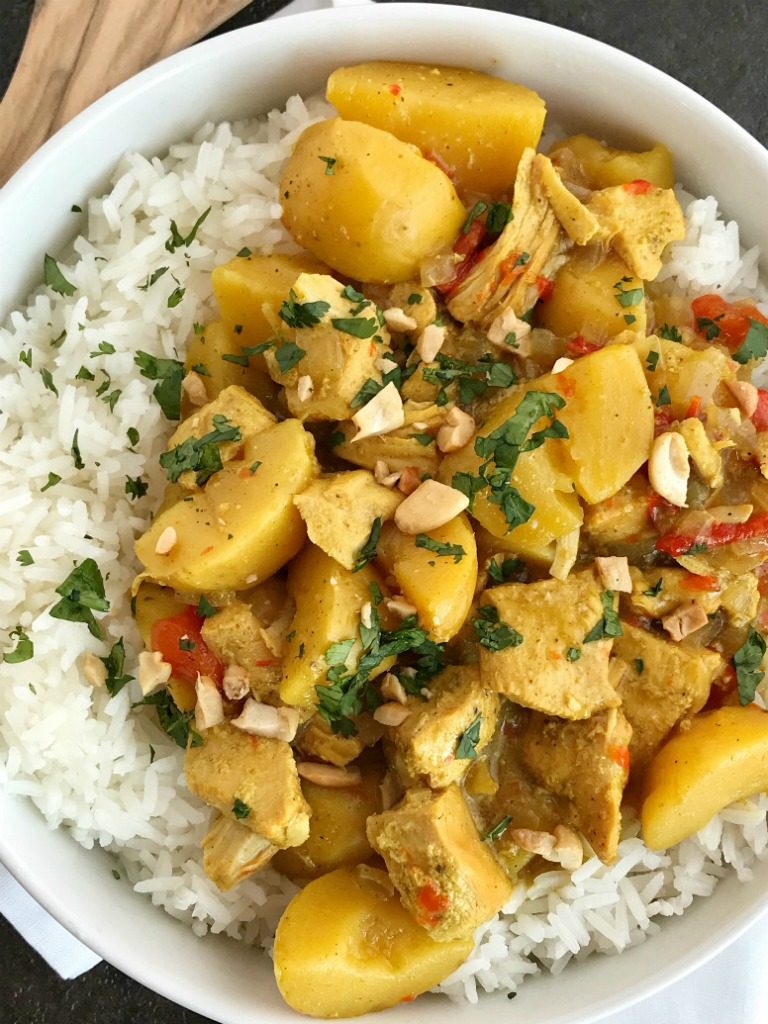All the flavors of classic chicken coconut curry but in a easy dump-it-and-forget-about-it slow cooker chicken coconut curry recipe! Perfectly spiced, creamy coconut, tender potatoes & chicken all served over some fragrant Jasmine rice. A simple & delicious easy weeknight family dinner. 