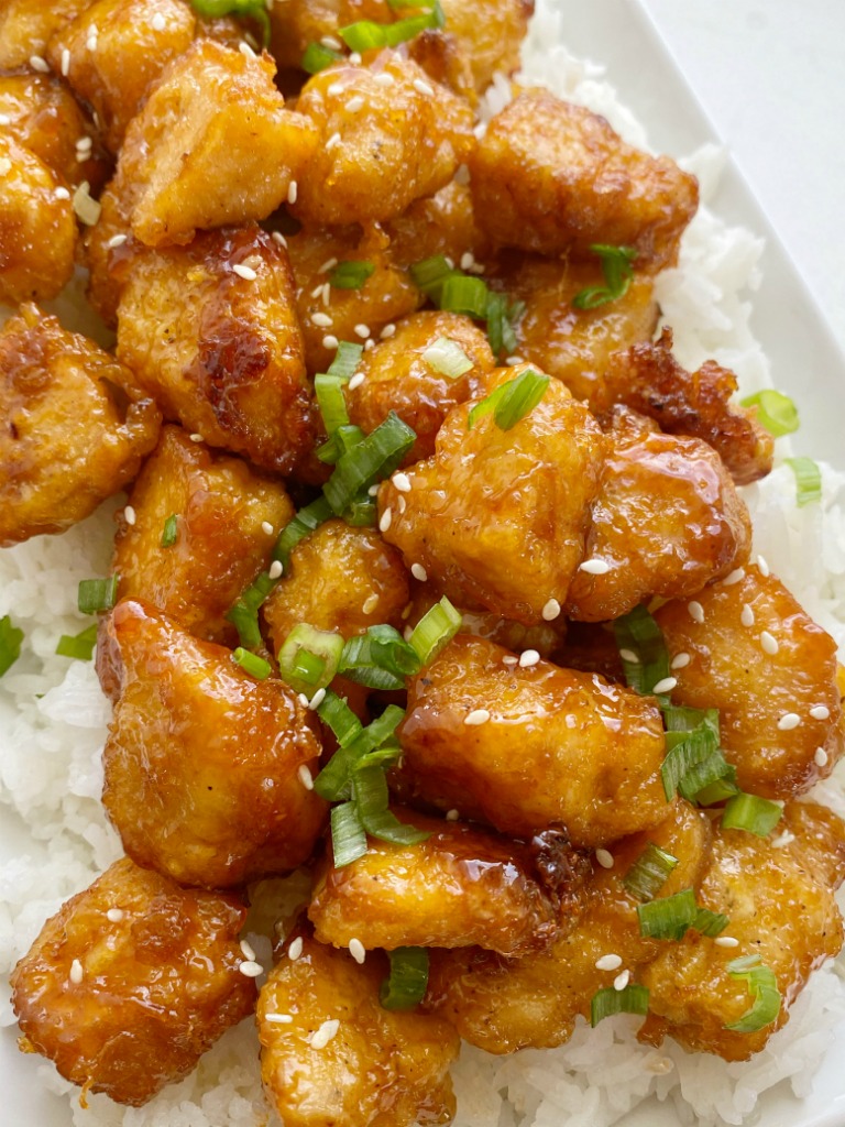 Homemade Baked Sweet & Sour Chicken is better than any take-out! Fresh and homemade with only a few ingredients. Chunks of crispy baked chicken in an easy sweet & sour sauce. 