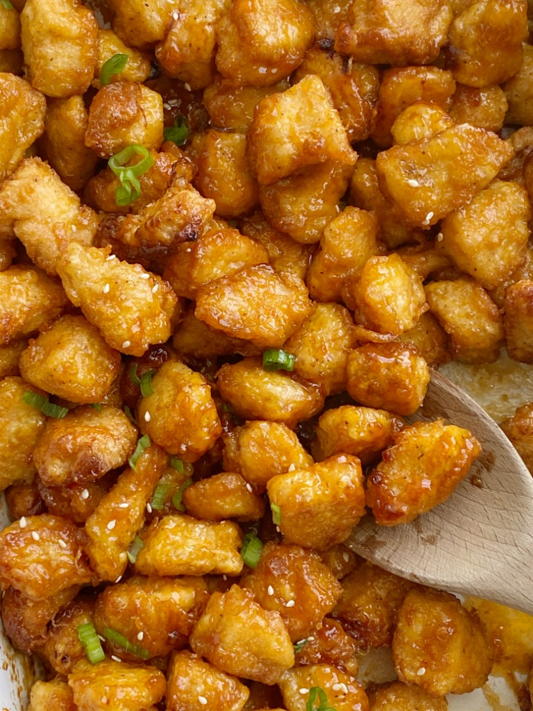 Homemade Baked Sweet & Sour Chicken is better than any take-out! Fresh and homemade with only a few ingredients. Chunks of crispy baked chicken in an easy sweet & sour sauce. 