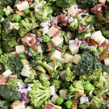 Bacon broccoli salad with fresh broccoli, mozzarella cheese chunks, in a sweet mayo dressing.