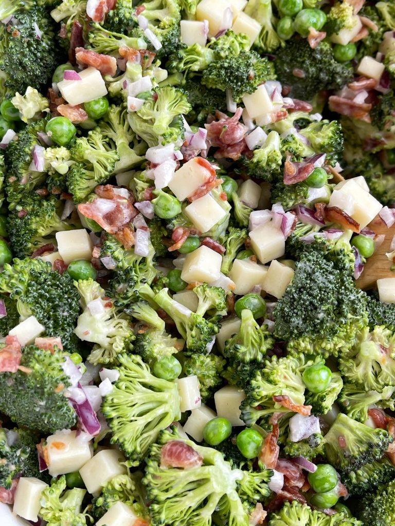 Bacon broccoli salad with fresh broccoli, mozzarella cheese chunks, in a sweet mayo dressing.