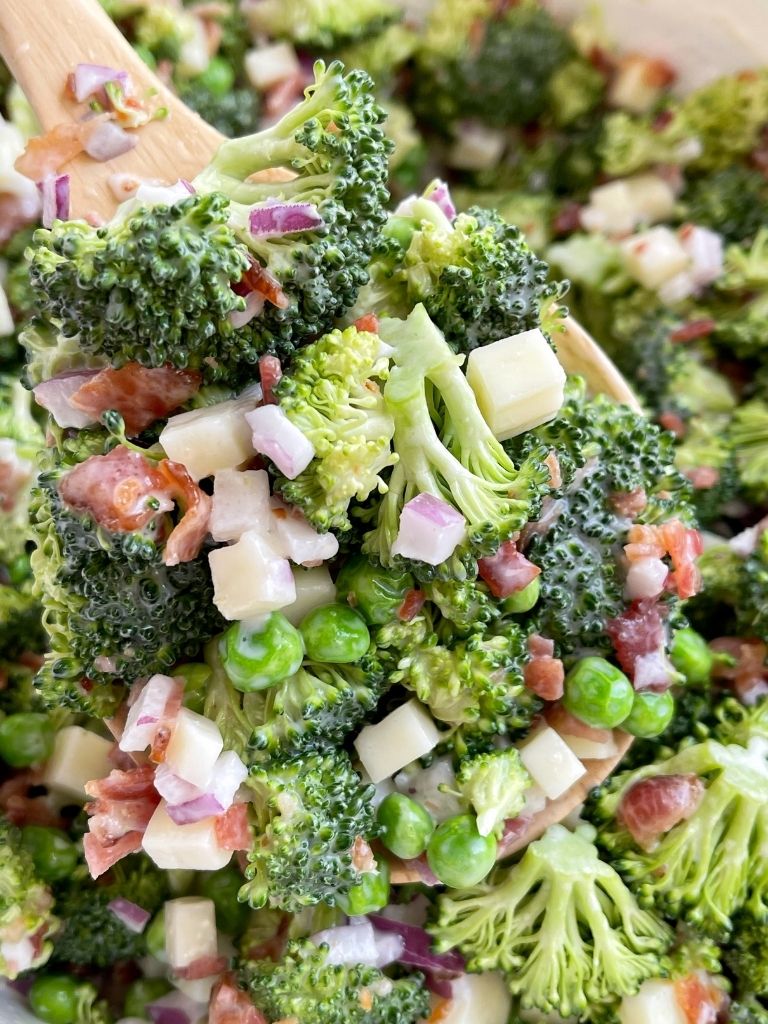 A scoop of bacon broccoli salad