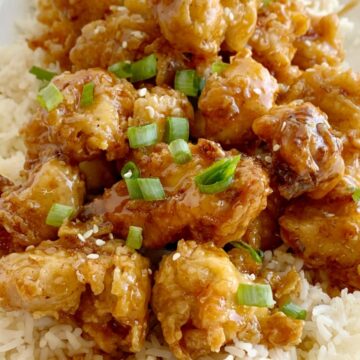 Honey Chicken has the crispiest, most delicious coating ever! Chunks of chicken dipped in seasoned flour & buttermilk, and then pan fried to crispy chicken perfection. Cover the crispy honey chicken in a sweet homemade honey sauce and serve over rice!