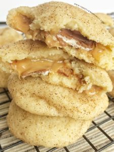 Soft, thick, chewy snickerdoodle cookies stuffed with a Milky Way Caramel Apple! These are so good!