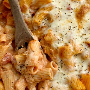 Pasta Bake with ziti pasta noodles, mozzarella cheese, cream cheese, jarred spaghetti sauce, diced tomatoes, and seasonings. Comes together in just minutes and it's a quick & easy dinner that's perfect for busy weeknights.