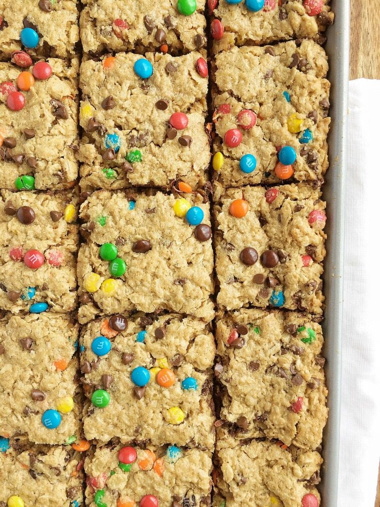 No Flour Monster Cookie Bars are loaded with oats, peanut butter, chocolate chips, and m&m's. They bake in a cookie sheet and make enough to feed a crowd. Plus, there is no flour in them!