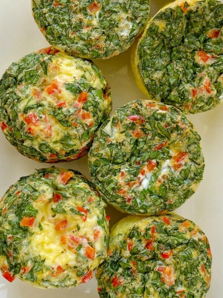 Egg Muffin Cups are the perfect healthy breakfast and you can make these ahead of time for breakfast all week long! Eggs, spinach, red bell pepper, cheese, and seasonings are all you need for this breakfast recipe. 