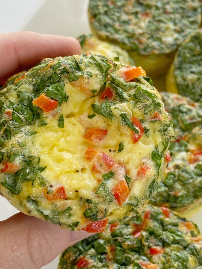 Egg Muffin Cups are the perfect healthy breakfast and you can make these ahead of time for breakfast all week long! Eggs, spinach, red bell pepper, cheese, and seasonings are all you need for this breakfast recipe.