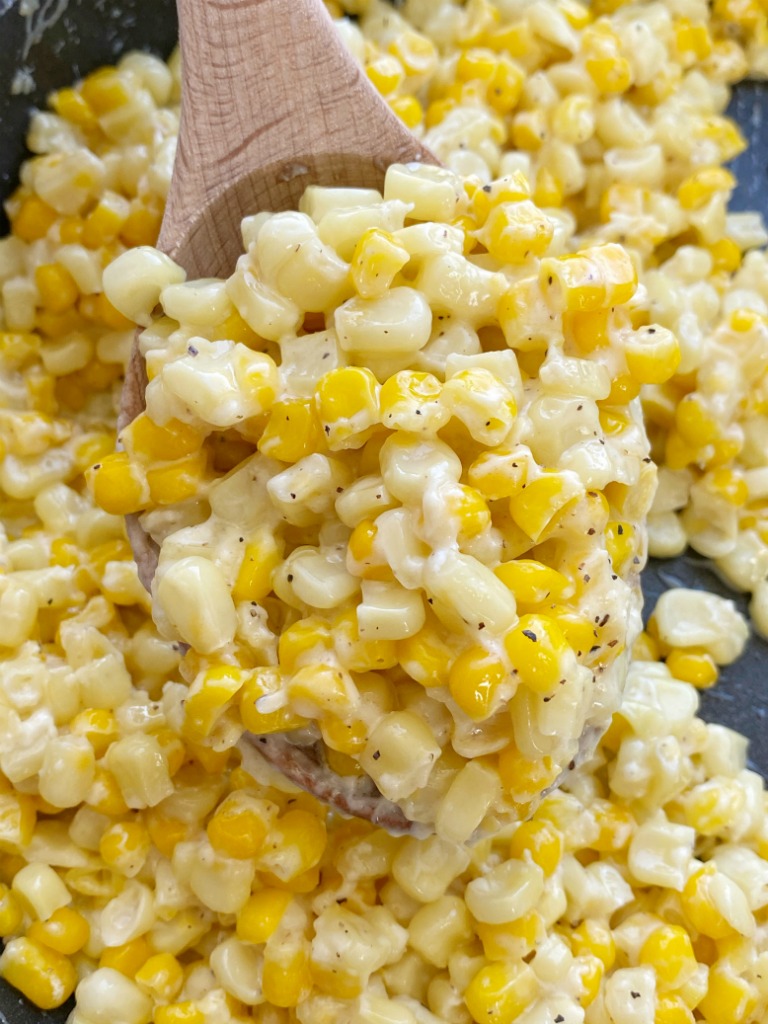 Honey Butter Skillet Corn is an easy 15 minute side dish with frozen corn, honey, butter, and cream cheese! So creamy, sweet, and delicious.