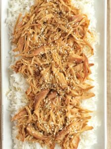 Slow cooker honey teriyaki chicken is a family favorite dinner. Only a few ingredients for a homemade honey teriyaki sauce and some chicken is all you need! The chicken is so tender thanks to the long cook time in the slow cooker. Serve over cooked rice and drizzle with additional teriyaki sauce.