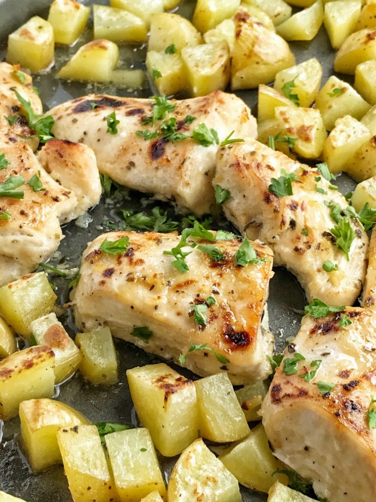 One sheet pan and the oven is all you need for a delicious and hearty dinner. Moist, tender chicken glazed with a honey garlic sauce and chunked potatoes covered in a simple seasoning of olive oil, salt, and pepper. This is a must try for dinner!