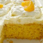 Pig Pickin' Cake Recipe | Cake Mix | Boxed Cake Mix | Easy Dessert Recipe | Orange Pineapple Cake is an easy cake recipe that starts with a boxed cake mix and canned mandarin oranges. Topped with a delicious and fluffy whipped pineapple vanilla pudding frosting. So moist, light, and refreshing.