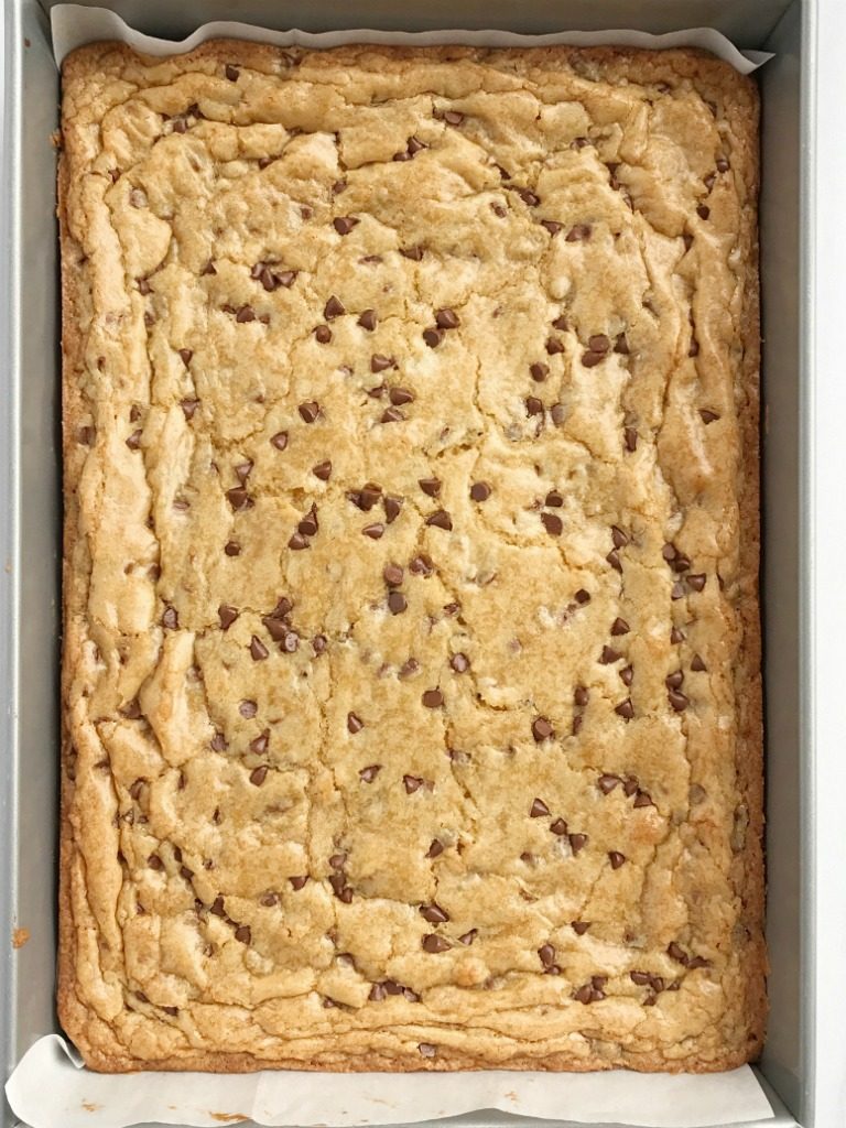 Chocolate chip cookie blondie bars are a chewy cookie bar loaded with chocolate chips and the best dessert! These bars bake in one pan and are so simple to make. They bake up perfectly sweet & chewy each time with crisp, buttery edges and a super soft middle. If you love chocolate chip cookies then you will want to make these.