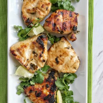 Fire up the grill for this Honey lime & cilantro marinated grilled chicken. It's so flavorful thanks to the marinade of honey, lime, cilantro, olive oil, fresh garlic, and seasonings. Make this for an easy and delicious weeknight dinner or weekend BBQ.