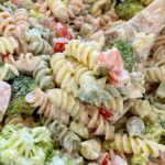 Ranch Pasta Salad is the best pasta salad side dish! Rotini noodles, cucumber, tomato, broccoli, parmesan cheese with an easy dressing of ranch. Everyone will love this pasta salad!