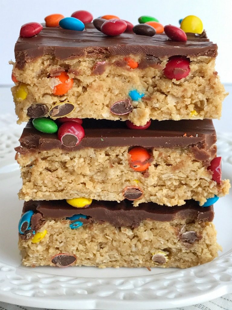 All your favorites about monster cookies but in no-bake, egg free monster cookie dough bars! Peanut butter, oats, chocolate, and m&m's. These can be made in just minutes and are a fun treat or dessert for the kids to make. Everyone will love these easy and simple cookie dough bars.