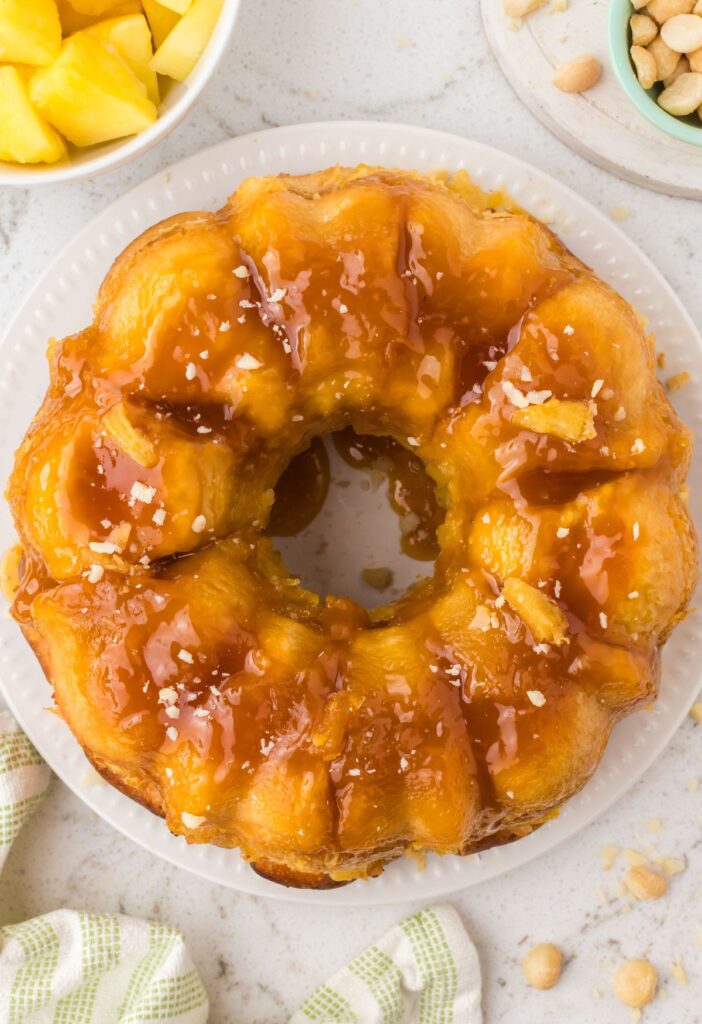 Overhead pic of the tropical monkey bread with pineapple and macadamia nuts on the side. 