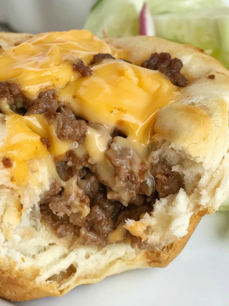 Cheeseburger biscuit cups are a kid-approved, family favorite dinner that are perfect for back-to-school. Simple ingredients, easy to prepare, and a 30 minute meal. Refrigerated biscuit cups loaded with a cheeseburger filling. Everyone will love these!