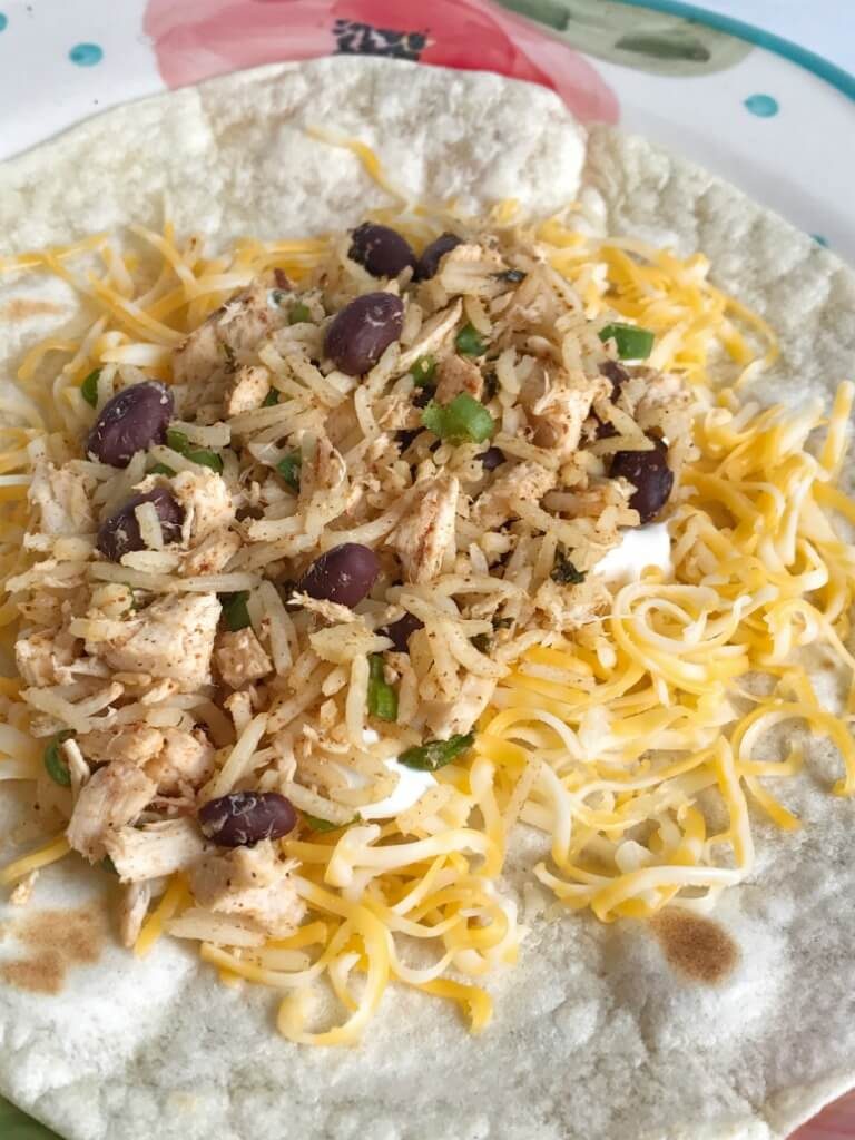 These crispy southwest chicken skillet burritos are so easy to make, versatile, and a quick & easy 30 minute dinner | togetherasfamily.com