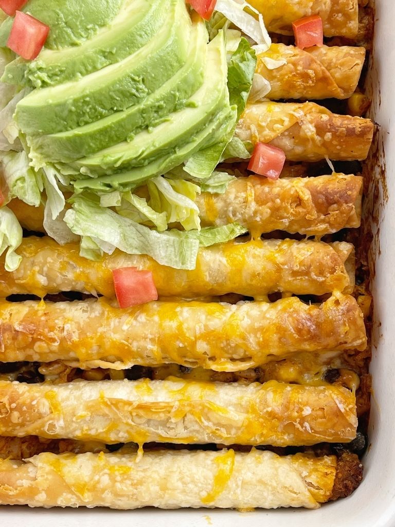 Beef taquito casserole is so easy to make with frozen taquitos and topped with all your favorite taco toppings.