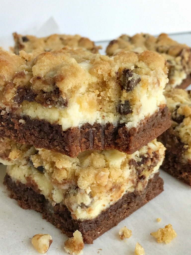 You won't believe how easy these chocolate chip cookie cheesecake brownie bars are to make! Convenient packages of brownie mix and chocolate chip cookies make these bars a cinch to prepare. Brownie base with a sweet cheesecake middle, and topped with chocolate chip cookies. These brownie bars are such a delicious dessert.