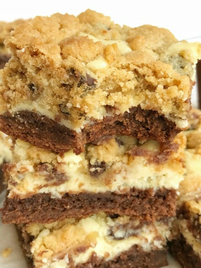You won't believe how easy these chocolate chip cookie cheesecake brownie bars are to make! Convenient packages of brownie mix and chocolate chip cookies make these bars a cinch to prepare. Brownie base with a sweet cheesecake middle, and topped with chocolate chip cookies. These brownie bars are such a delicious dessert.
