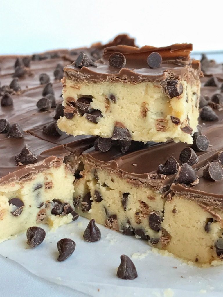 If your favorite part of making cookies is the dough then you will LOVE these no bake chocolate chip cookie dough bars! Such a fun & sweet dessert recipe that will satisfy any sugar or cookie dough craving. 
