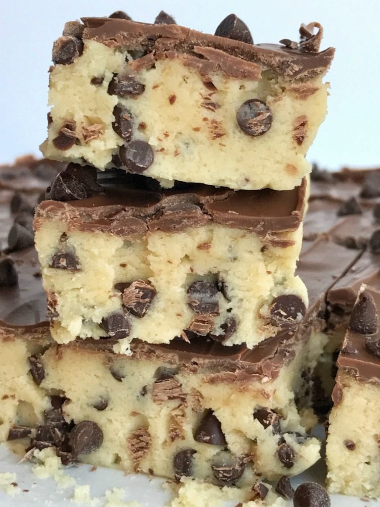 If your favorite part of making cookies is the dough then you will LOVE these no bake chocolate chip cookie dough bars! Such a fun & sweet dessert recipe that will satisfy any sugar or cookie dough craving. 