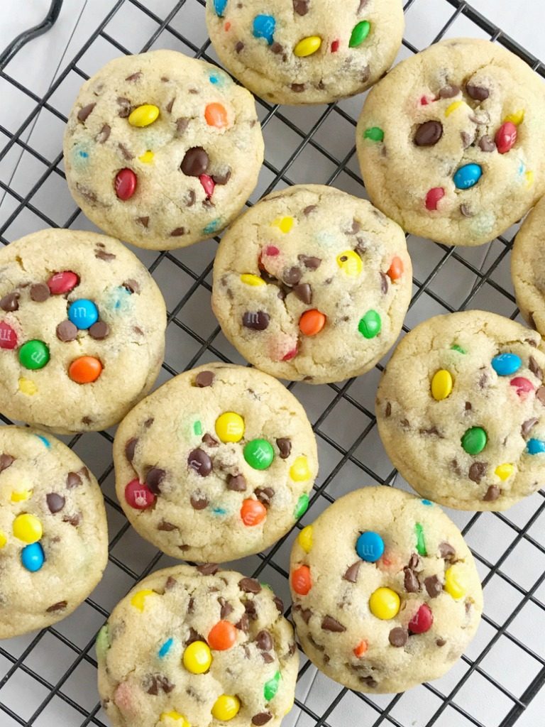 M&M Chocolate chip pudding cookies are thick, chewy, soft baked, and loaded with chocolate chips and mini m&m's! They're made super soft with the added pudding mix right in the dough. These cookies will disappear fast because they are always a hit and everyone loves them.
