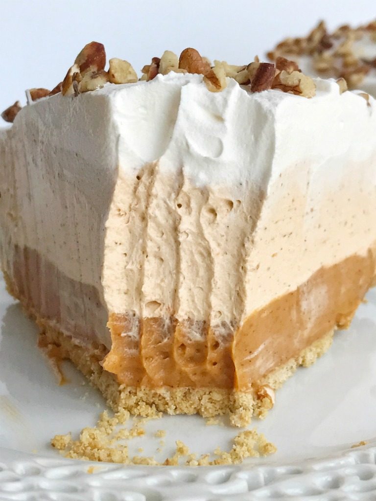 No bake triple layer pumpkin spice pudding pie is a delicious twist to classic pumpkin pie. It's a creamy, no bake pie with three layers of pumpkin spice flavor and only 5 ingredients. Perfect for Thanksgiving dinner because it can be made the day before