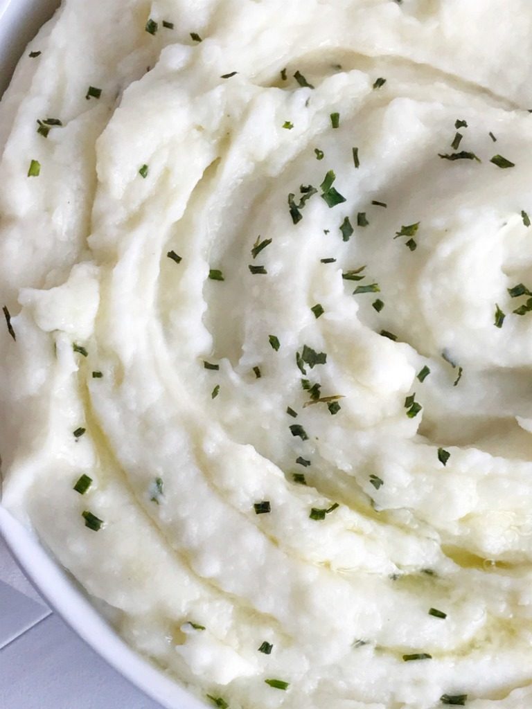 These are perfect cream cheese mashed potatoes. Only a few simple ingredients for creamy, smooth, and mashed potatoes that are full of flavor. A great side dish for Thanksgiving, dinner, or any special Holiday dinner | togetherasfamily.com #thanksgiving #recipe #mashedpotatoes